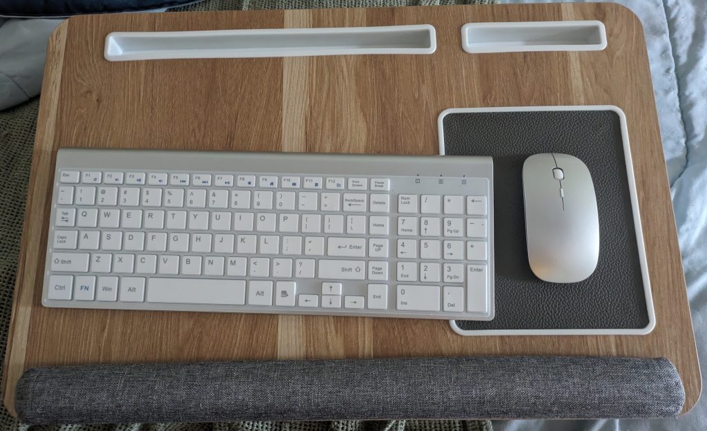 Lap desk, wireless keyboard, wireless mouse. These can sit on her lap instead of needing to balance the laptop itself.